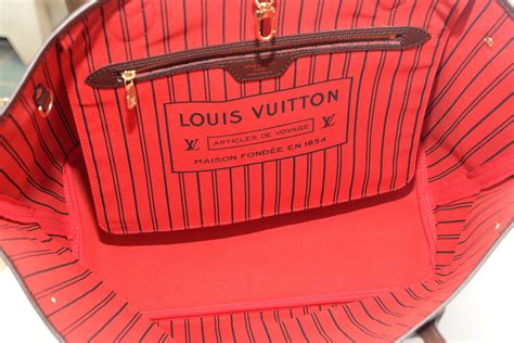 louis vuitton neverfull serial number location|louis vuitton date code check.